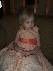 Our Cara in her peach dress.