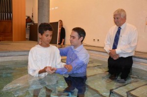 Thomas being baptized two weeks ago.